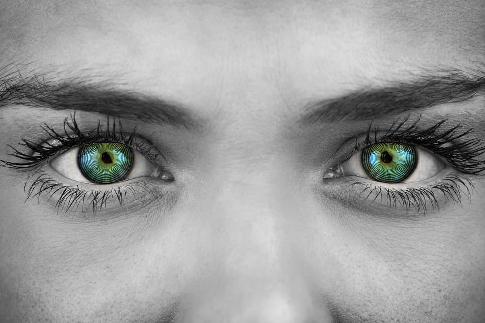 Black and white photo of woman with green eyes