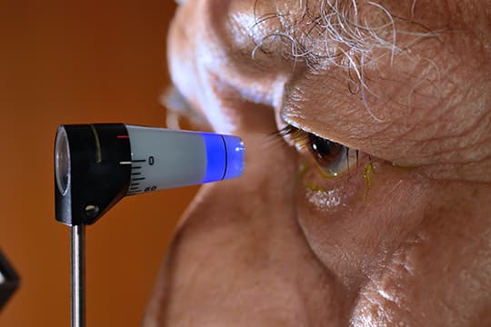 Older man getting eye pressure test
